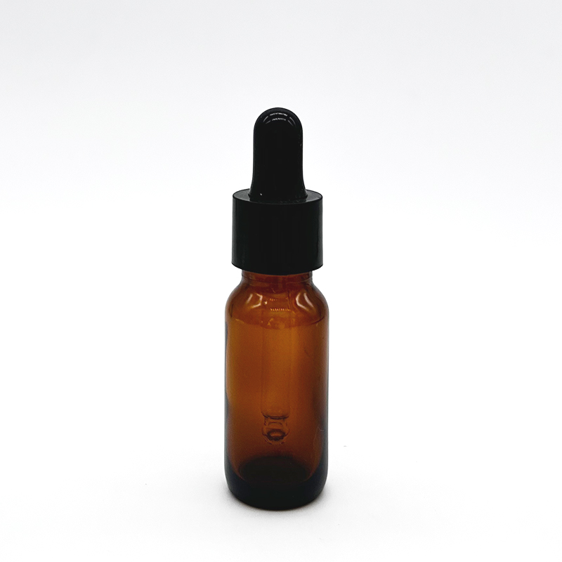 Boston round glass bottle